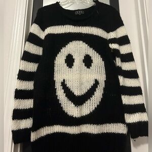 Cable knit smiley sweater